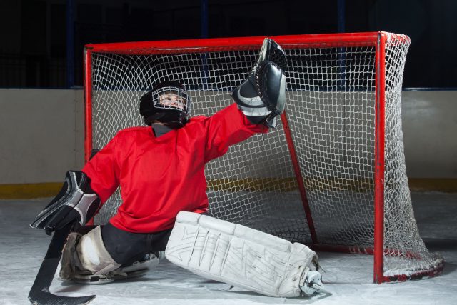 Hockey gardien : position papillon